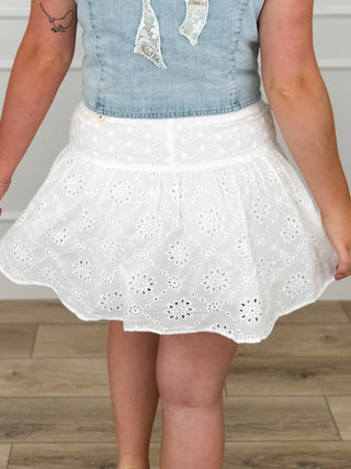 White high-rise cotton skort with eyelet floral cutwork and flared skirt