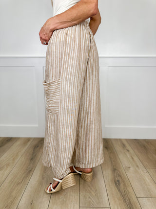 High-rise cargo wide-leg pants, tan vertical stripe, side cargo pocket detail, wide legs