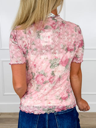 Sheer mesh pink floral short-sleeve top, back view with high mock neck