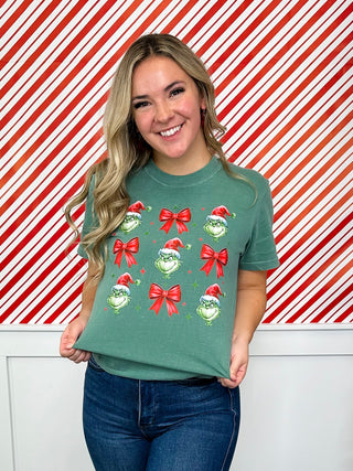 Green short-sleeve crewneck cotton tee with Santa and bow print on front