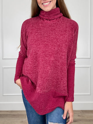 Wine red heather knit turtleneck top with long dolman sleeves and draped hem