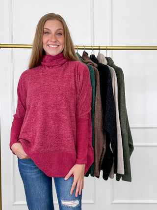 Wine red heather knit turtleneck top with long dolman sleeves, relaxed curved hem