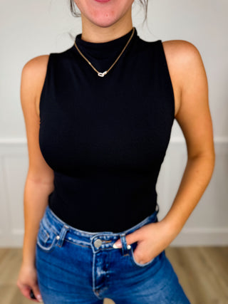 Black sleeveless bodysuit top with high neckline