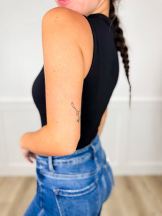 Black sleeveless bodysuit top, side view, high neckline
