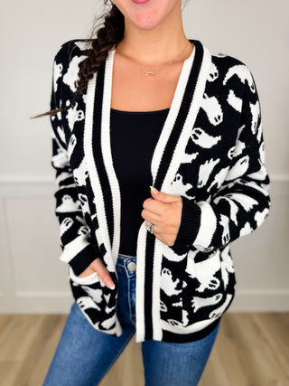 Ghost-pattern knit cardigan, black with white trim and open front