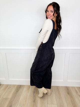 Charcoal corduroy overalls, side profile with wide leg silhouette and straps