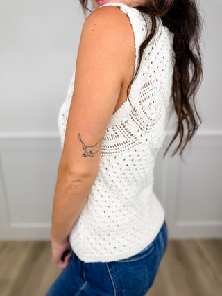 Ivory cotton knit sleeveless top with openwork eyelet pattern, side view