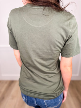 A Pawsitively Merry Ride Cotton Short Sleeve Green Avery Mae Graphic Tee Shirt