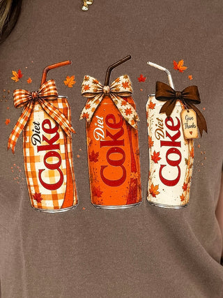 Brown cotton short-sleeve graphic tee with Coke and Diet Coke can prints