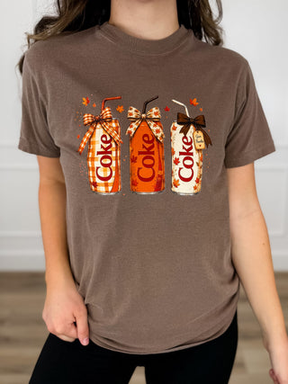 Brown short-sleeve cotton graphic T-shirt with three Coke bottles front print