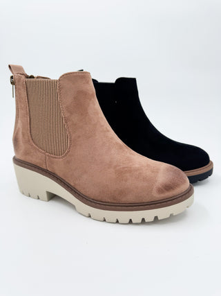 Tan faux suede Chelsea booties with elastic side panels and chunky tread sole