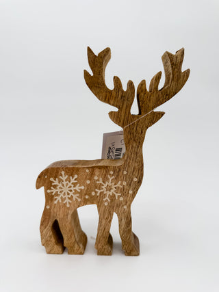 Wood stag decor with snowflake cutouts, standing with lifted antlers