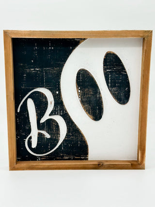Rustic wood sign with BOO lettering