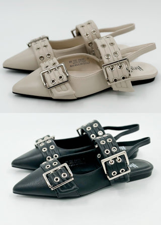 Faux leather mules with square buckle accents, bone white and black