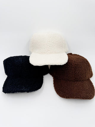 Ivory, dark, and mocha brown teddy cap hats