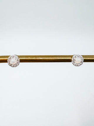 Silver round stud earrings with sparkling textured face