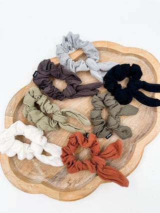 Multicolor hair scrunchie set with gathered elastic bands in dark and light shades