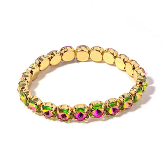 Gold-tone bracelet with oval multicolor stones—green and purple—on disc links