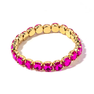 Gold-tone bracelet with vivid magenta faceted stones and round link settings