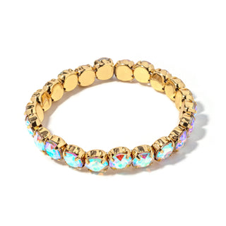Gold-tone bracelet with round iridescent opal-like stones and chain links