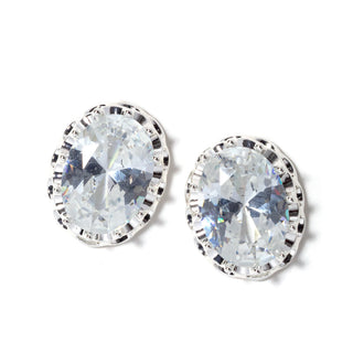 Oval crystal stud earrings with silver-tone bezel and clear crystal