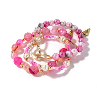 Beaded bracelet set with pink beads, pearl accents, and gold chain links