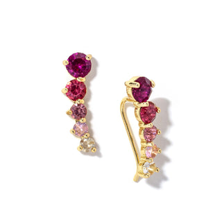 Gold-tone drop earrings with pink heart and oval stones, dangling charms