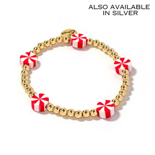 Gold-tone peppermint bead bracelet with red and white candy-striped charms