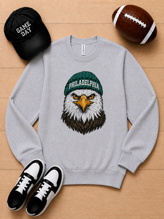Grey long-sleeve graphic crewneck sweatshirt with Philadelphia eagle logo