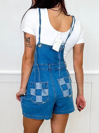 Denim patchwork romper with adjustable straps and buttoned front, medium wash