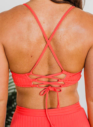 Coral ribbed swim top with crisscross back straps and tie detail