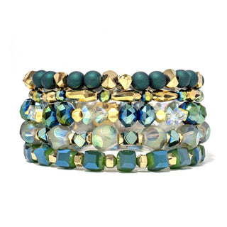 Beaded bracelet stack with teal and iridescent stones and gold-tone accents