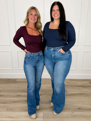 Long-sleeve knit tops in maroon and navy, fitted with round neckline
