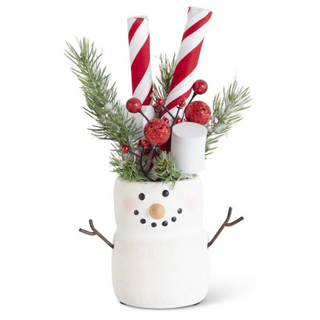 White ceramic snowman shelf sitter with candy-cane arms and red berry pine decor
