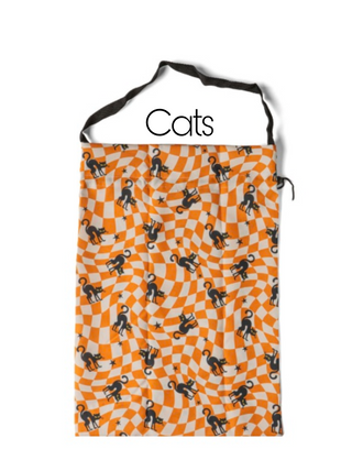 Orange-and-white check candy bag with black cat silhouettes pattern.