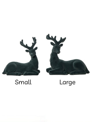 Small and large dark green resin deer ornaments, paired