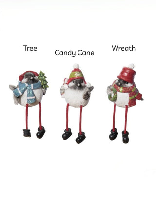 Three resin shelf sitter bird figures: tree, candy cane, and wreath accents