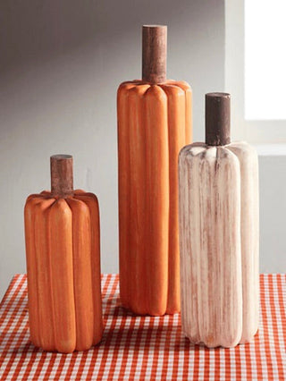 Ribbed wooden gourd decor set with orange and white pieces, dark stems