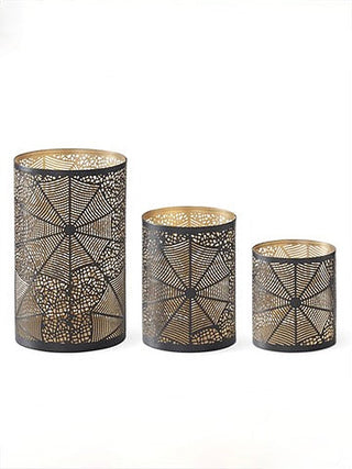 Black metal candle holder set of three with geometric cutout cylinders