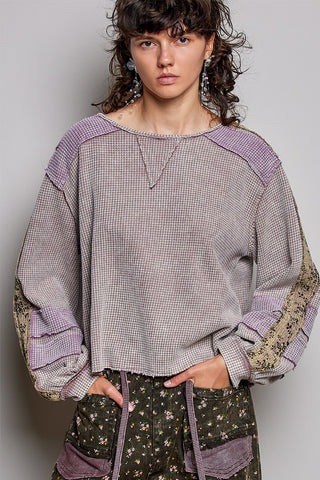 Lilac check knit top with contrast cuff and bow-tie sleeve detail