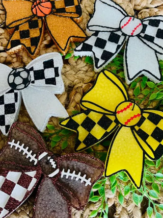 Set of sports sideline sparkle bows with yellow, white, brown, and orange checker designs