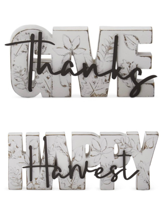 Resin letter decor showing 'thanks' and 'Harvest' phrases in white with black cursive