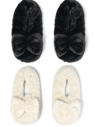 Set of black and ivory plush heated slippers with bow detail