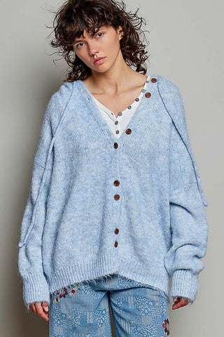 Powder blue hooded cardigan sweater with button front and chunky knit texture