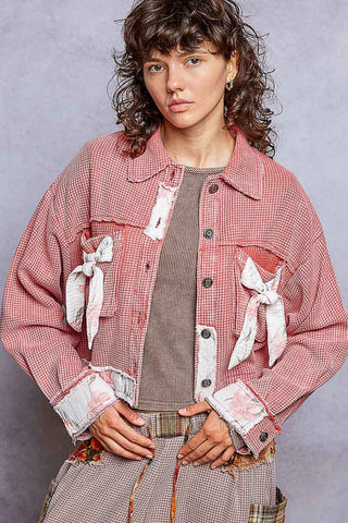 Dried tomato knit top with button front, pointed collar, patch pockets, long sleeves