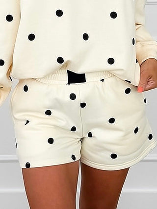 High-rise cream cotton blend shorts with black polka-dot print