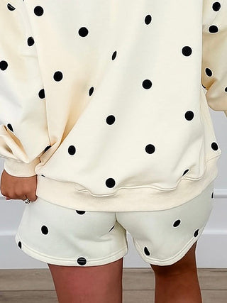 High-rise cream cotton blend shorts with scattered black polka dots
