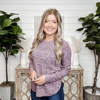 Marled knit long-sleeve sweater top in plum with crew neck and curved hem