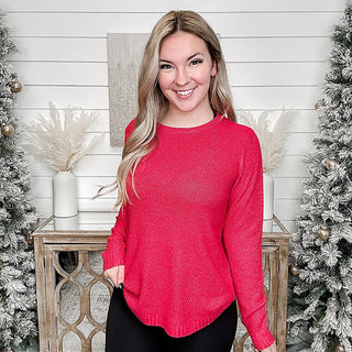 Marled knit long-sleeve sweater top in bright red with crew neck and curved hem