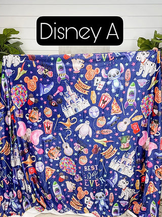Blue sherpa blanket with Disney character collage and pattern print